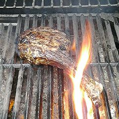 A picture of Grilled Cowboy Ribeye Steak with Acccompaniment Ideas.