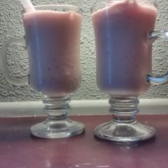 A picture of Pineapple mango peach strawberry smoothie.