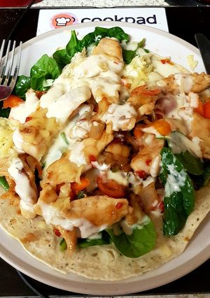A picture of My chicken, chilli, cheese open wrap 😀.