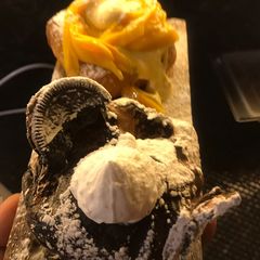 A picture of Coffee and chocolate doughnut.