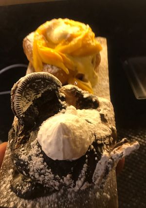 A picture of Coffee and chocolate doughnut.