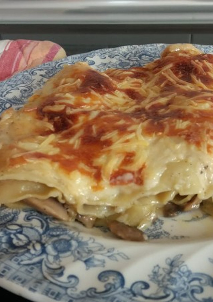 Una foto de Lasaña de champiñones y cebolla