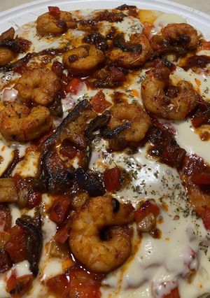 Una foto de Pizza de Langostinos🍤