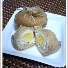 A picture of Abura-age and Egg Simmered Pouches (Kinchaku).