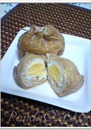 A picture of Abura-age and Egg Simmered Pouches (Kinchaku).