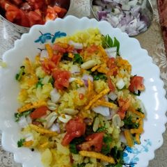 A picture of Poha with mix vegetables.