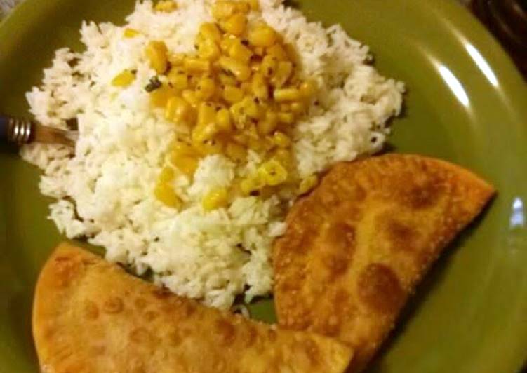 White rice, sauteed corn and ground turkey empanadas