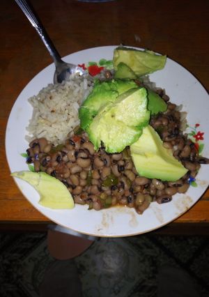 A picture of Fried white beans served with rice.
