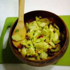 A picture of Green Apple, Celery and Honey roasted Macadamia Nuts with Dijon Mustard dressing.