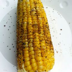 A picture of Corn On The Cob With Cajun Spice.