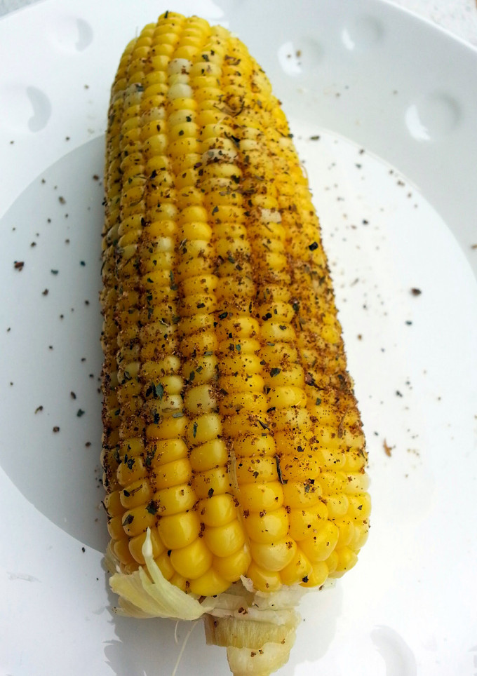 A picture of Corn On The Cob With Cajun Spice.