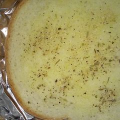 A picture of Buttery garlic bread.