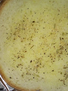A picture of Buttery garlic bread.