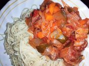 A picture of spaghetti and stew