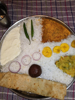 A picture of Rice Sambar Alu Sabji.