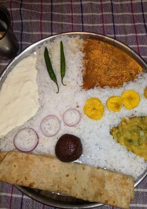 A picture of Rice Sambar Alu Sabji.
