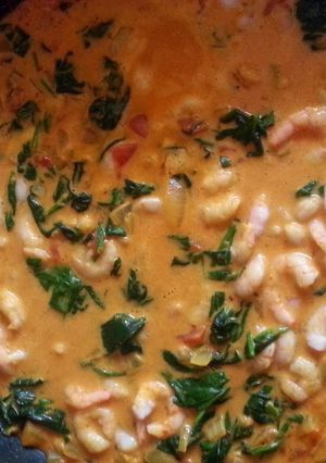 A picture of Prawn and spinach coconut curry.