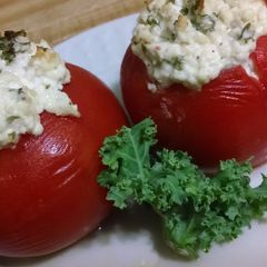 A picture of Cheesy Stuffed Tomatoes.