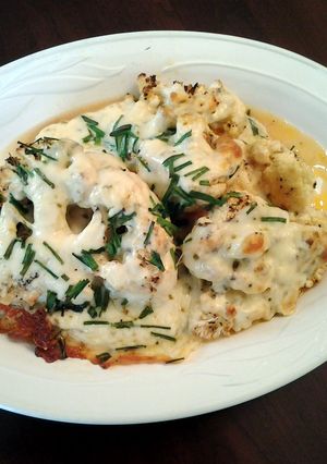 A picture of Cauliflower Cheese "Steaks".