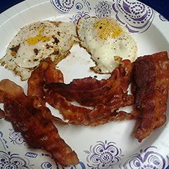 A picture of Bacon and fried eggs.