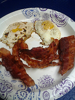 A picture of Bacon and fried eggs.