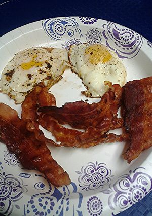 A picture of Bacon and fried eggs.