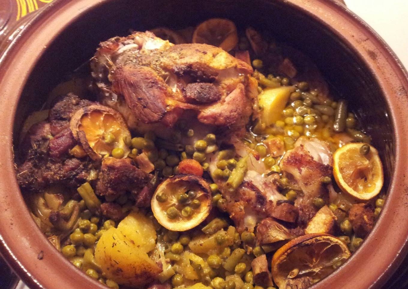 Pork knuckle and neck in a clay pot