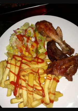 Una foto de Carnes mixtas horneadas en salsa barbiquiu casera