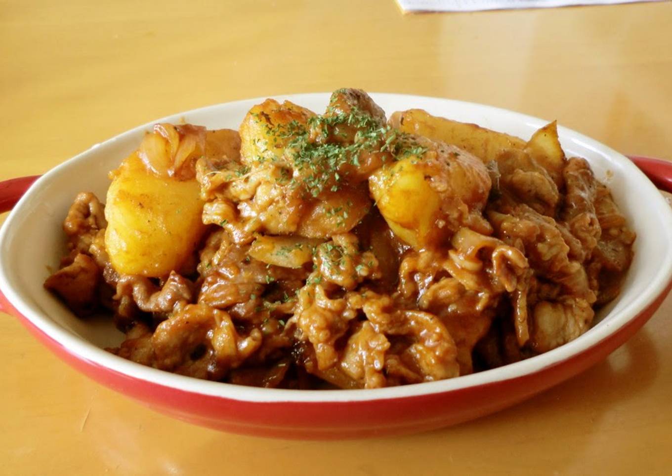 Grilled pork and potatoes with BBQ sauce