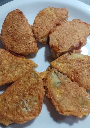 Una foto de Lunas de berenjenas con cebollas caramelizadas
