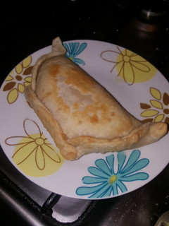 Una foto de Empanada de queso y choclo