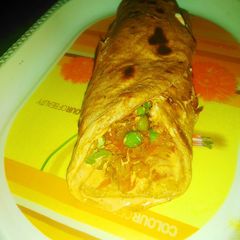 A picture of Cheese roll paratha.