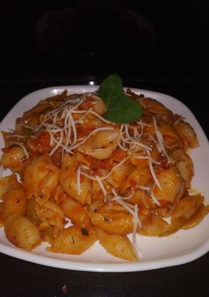 A picture of Conchiglie Pasta in red sauce.