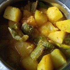 A picture of Jhinge  aaloo posto.