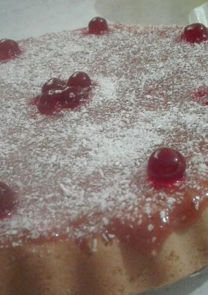 Una foto de Gnoise de vainilla, mermelada de membrillos y coco