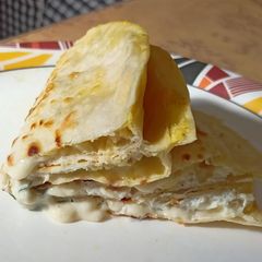 A picture of Cheesy egg tortilla.