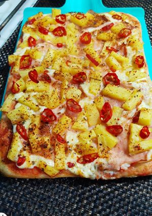 Una foto de Pizza Hawaiana