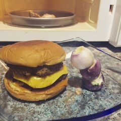 A picture of Double Cheese Burger And Stuffed Baby Onions.