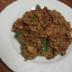 A picture of Indian Vegetable Curry with Eggplant and Bell Pepper.