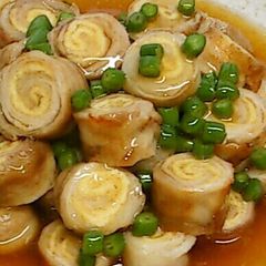 A picture of Fried Pork and Aburaage Spirals with Ankake Thick Sauce.