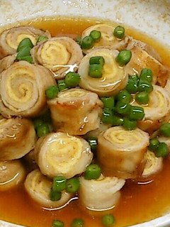 A picture of Fried Pork and Aburaage Spirals with Ankake Thick Sauce.