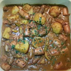 A picture of Sausage and potato pot.
