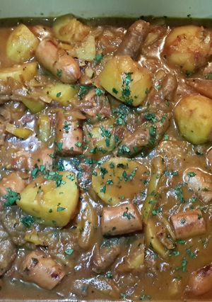 A picture of Sausage and potato pot.