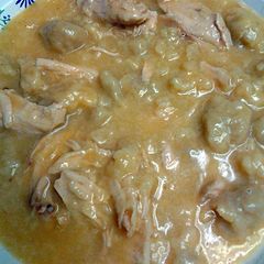A picture of chicken and homemade dumplings.