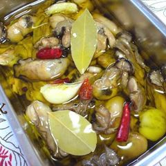 A picture of Oil-Marinated Oysters.