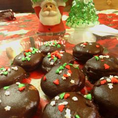 A picture of sunshine 's christmas chocolate peanutbutter cookies.
