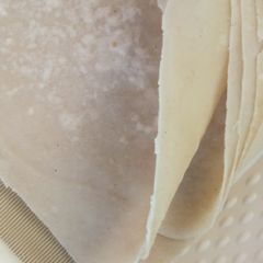 A picture of Homemade samosa patties/ spring roll sheet .