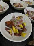 Ceviche de chicharrón al Barril ahumador (cilindro)
