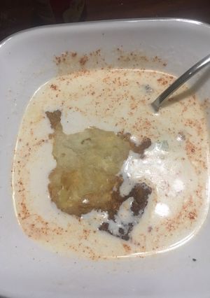 A picture of Crab bisque with souffléd crackers.