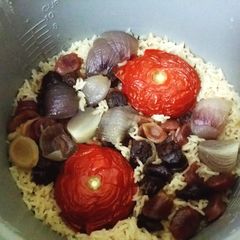 Tomato rice with Chinese sausage A picture of Tomato rice with Chinese sausage.